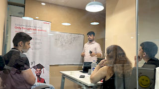 upGrad Ghaziabad office - student and parents with the counselling team after their study abroad session